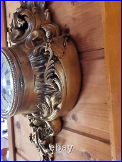 Horloge, pendule d'applique en bronze du XIXe siècle