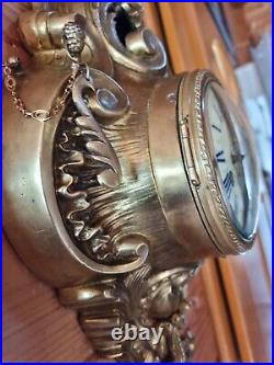 Horloge, pendule d'applique en bronze du XIXe siècle