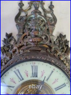 Horloge, pendule d'applique en bronze du XIXe siècle