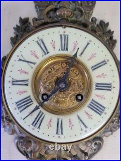 Horloge, pendule d'applique en bronze du XIXe siècle