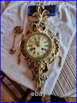 Horloge, pendule d'applique en bronze du XIXe siècle