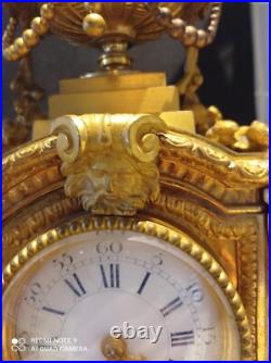 Horloge pendule en bronze doré 19e