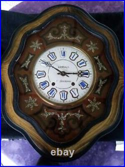Oeil de Boeuf Pendule Horloge émaillée en bois noirci Landais à Quelaines France