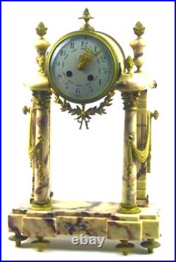 PENDULE portique en marbre veiné PENDULE portique en marbre veiné