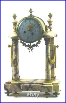 PENDULE portique en marbre veiné PENDULE portique en marbre veiné