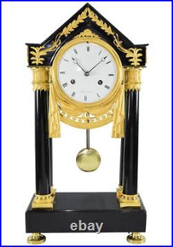 PORTIQUE MUGNIER. Kaminuhr Empire clock bronze horloge antique pendule uhren