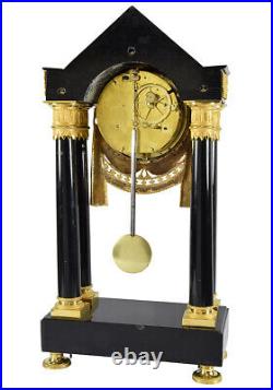 PORTIQUE MUGNIER. Kaminuhr Empire clock bronze horloge antique pendule uhren