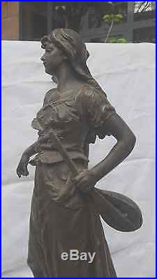 Pendule 1900, sculptures régule signées Bruchon, socle marbre onyx