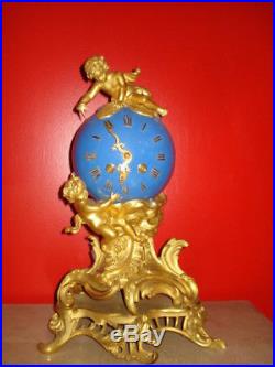 Pendule Bronze doré Napoléon III, boule terrestre, méc à lamelle