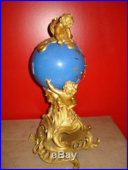 Pendule Bronze doré Napoléon III, boule terrestre, méc à lamelle