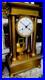 Pendule-Epoque-Empire-Regulateur-A-Chevilles-Portique-Bronze-01-rxwa