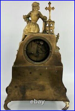 Pendule Epoque Romantique En Bronze Femme Au Calvaire Vincenti Et Cie 19e C2690
