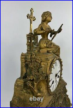 Pendule Epoque Romantique En Bronze Femme Au Calvaire Vincenti Et Cie 19e C2690