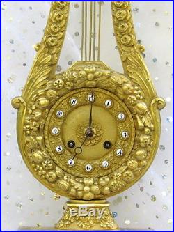 Pendule Lyre Empire en bronze non Napoléon III, Clock