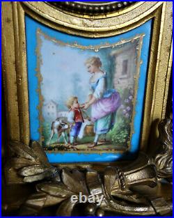 Pendule Napoléon III en porcelaine et métal doré XIXème