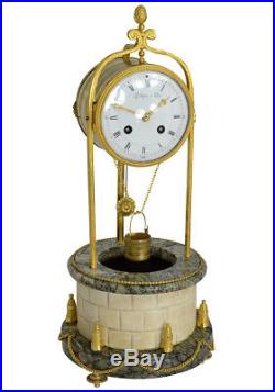 Pendule Puits à eau Léchopié Kaminuhr Empire clock bronze horloge antique cartel