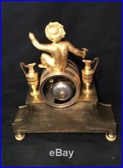 Pendule XVIIIème Siècle''Bacchus enfant'' en Bronze doré (Empire ormolu Clock)