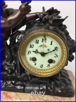 Pendule Xixeme Siecle, Avec Putti Et Oiseaux Patine Brune En Regule