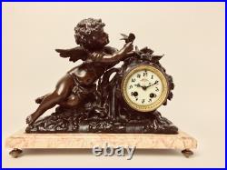 Pendule Xixeme Siecle, Avec Putti Et Oiseaux Patine Brune En Regule