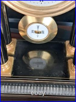 Pendule à colonnes