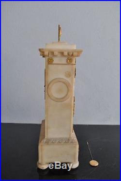 Pendule albatre blanc époque Empire bronze dorés XIXème