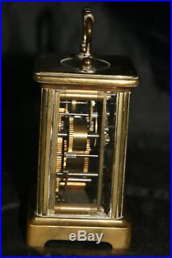 Pendule ancienne pendulette d'officier avec sa clef