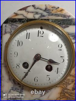 Pendule art deco marbre personnage regule peint en dore fonctionne sonne