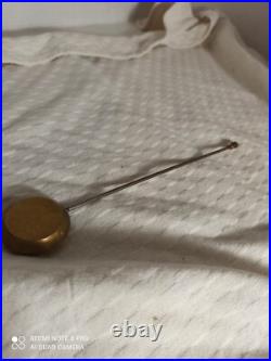 Pendule borne bronze dore style empire a restaurer ressorts ok