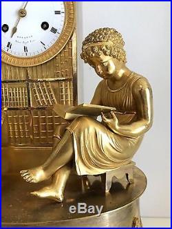 Pendule bronze doré dite l'étude signée KINABLE XIXe empire