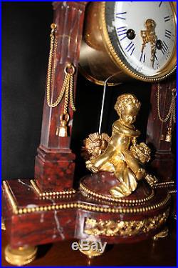 Pendule bronze doré au mercure et marbre XIX