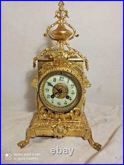 Pendule bronze dore fonctionne sonne