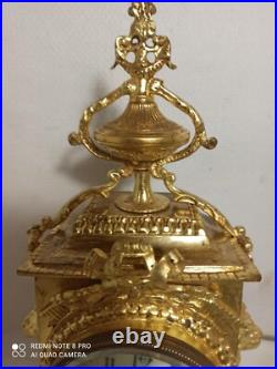 Pendule bronze dore fonctionne sonne