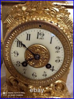 Pendule bronze dore fonctionne sonne