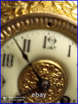 Pendule bronze dore fonctionne sonne