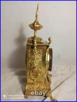 Pendule bronze dore fonctionne sonne