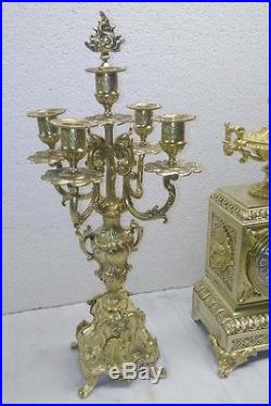 Pendule bronze et ses chandeliers