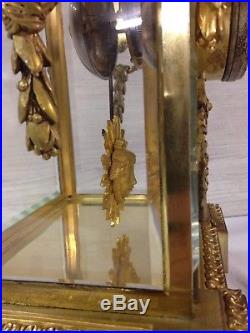 Pendule cage Style Louis XVI ancienne en Bronze et vitres Biseautées