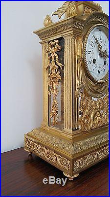 Pendule cage ancienne bronze doré Eugene Baguès bronzier Paris style Louis XVI