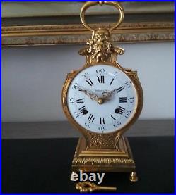 Pendule cartel en bronze collection d'art Horloge