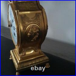 Pendule cartel en bronze collection d'art Horloge