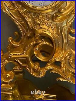 Pendule cartel en bronze doré de style Louis XV
