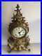 Pendule-cartel-horloge-made-in-Italie-bronze-de-style-Louis-XV-etat-de-marche-01-ninv
