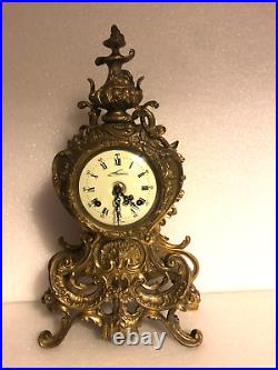 Pendule cartel horloge made in Italie bronze de style Louis XV état de marche
