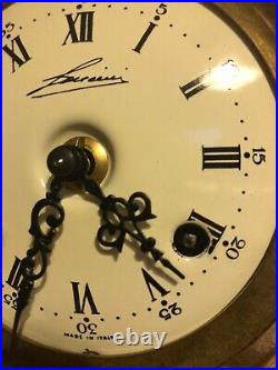 Pendule cartel horloge made in Italie bronze de style Louis XV état de marche
