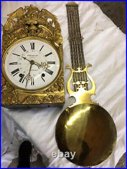 Pendule comtoise Horloge du XIXème Monflanquin grand balancier laiton