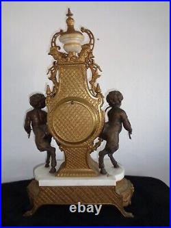 Pendule de cheminée horloge en bronze et marbre chérubins putti sans mouvement