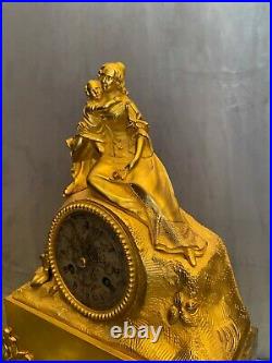 Pendule en bronze doré d'époque Charles X
