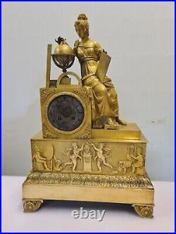 Pendule en bronze doré et ciselé, à l'allégorie de l'astronomie style empire