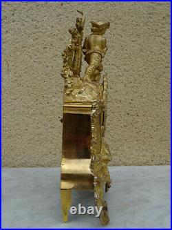 Pendule en bronze doré style rocaille dépoque Napoléon III