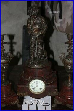 Pendule en bronze et marbre 19eme musicien avec son chien garniture de cheminée